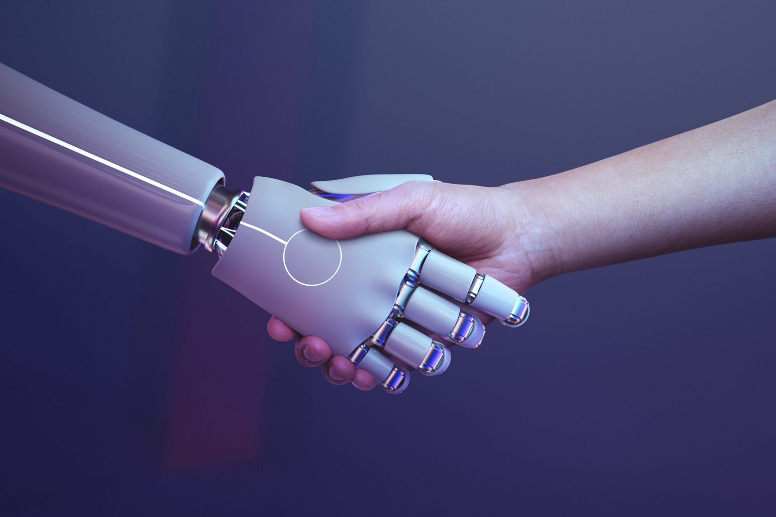A robotic hand and a human hand shaking, symbolizing human-AI collaboration.